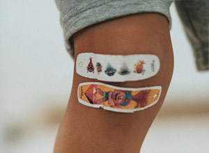 scrape knee bleeds plaster heal